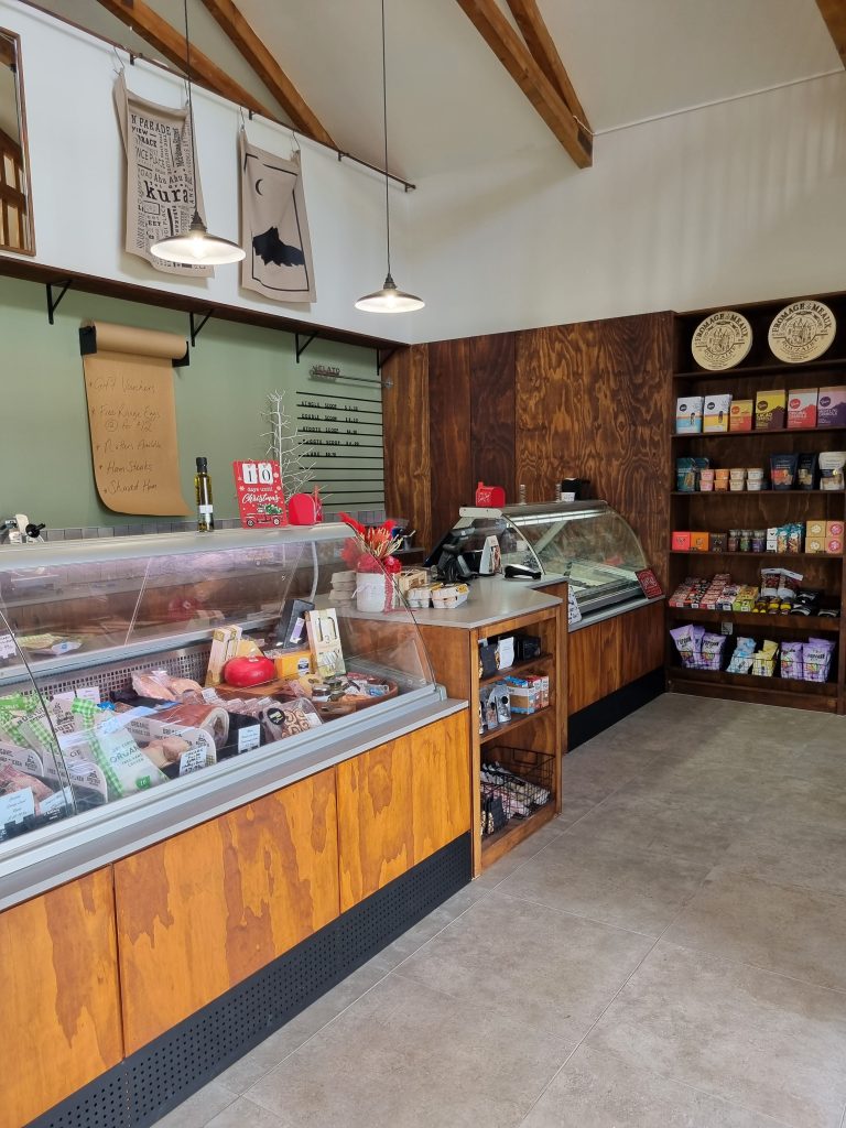 Locally crafted timber retail counters and display units at Oakura Meat Co & Fine Foods, featuring custom joinery built in Taranaki.