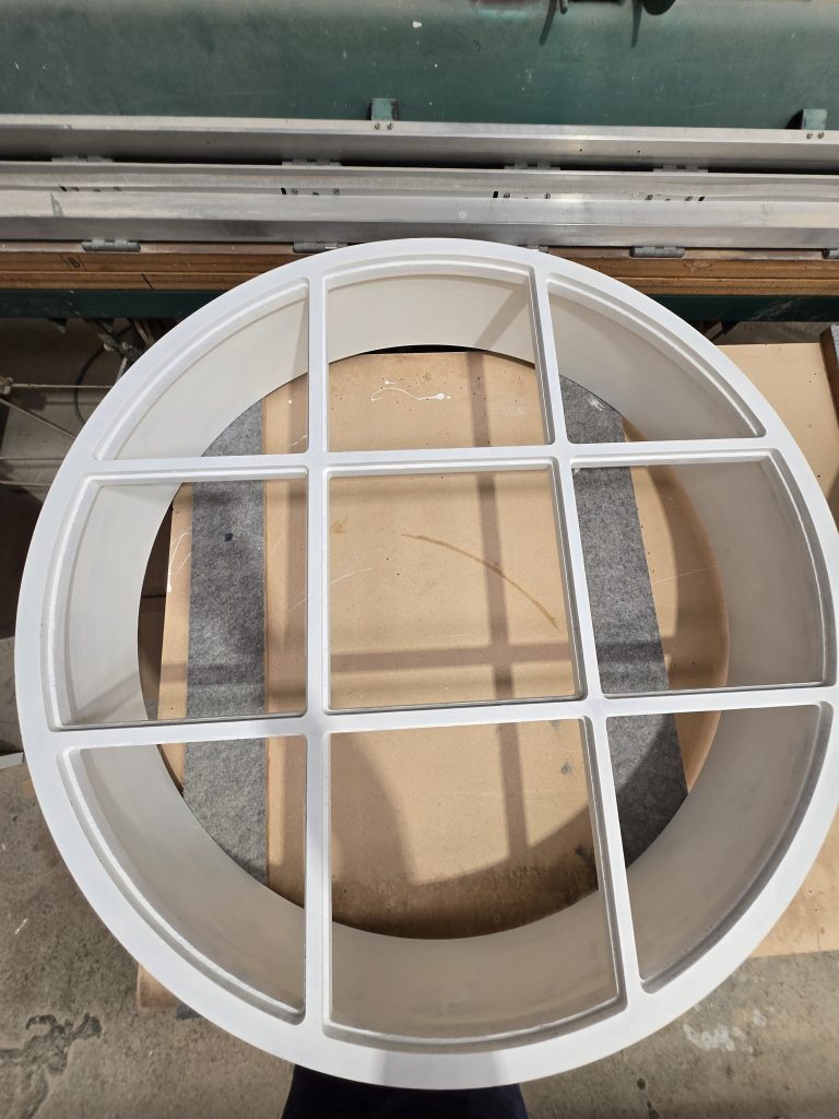 Custom circular timber portals with curved joinery detailing crafted by Newton Gordge Joinery in Taranaki.