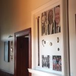 Custom timber display frame with integrated shelving and detailed mouldings, handcrafted by Newton Gordge Joinery.