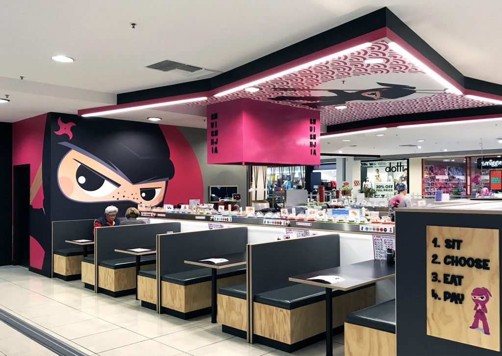 Sushi Ninja Express fit-out with plywood booth seating, laminate finishes and custom commercial joinery in New Zealand mall